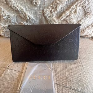 Limited edition Gucci sunglass case with cleaning tissue. New!